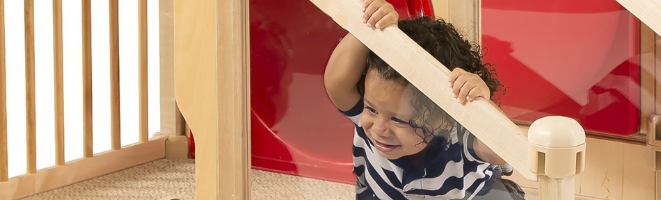 a child playing in a classroom