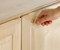 a hand demonstrating lock on doors