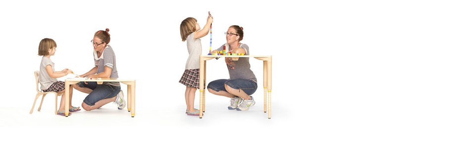 child playing at a table